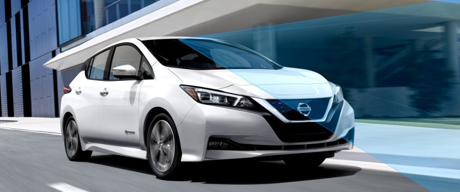 Nissan LEAF in city with driving sensor graphics